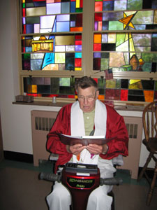 The Rev. Arnold Meiring, who is marking his 65th year in the priesthood, sits in the infirmary chapel at St. Charles Center in Carthagena preparing for Mass. An observance honoring Meiring and other religious with milestone anniversaries takes place July 1.<br>dailystandard.com